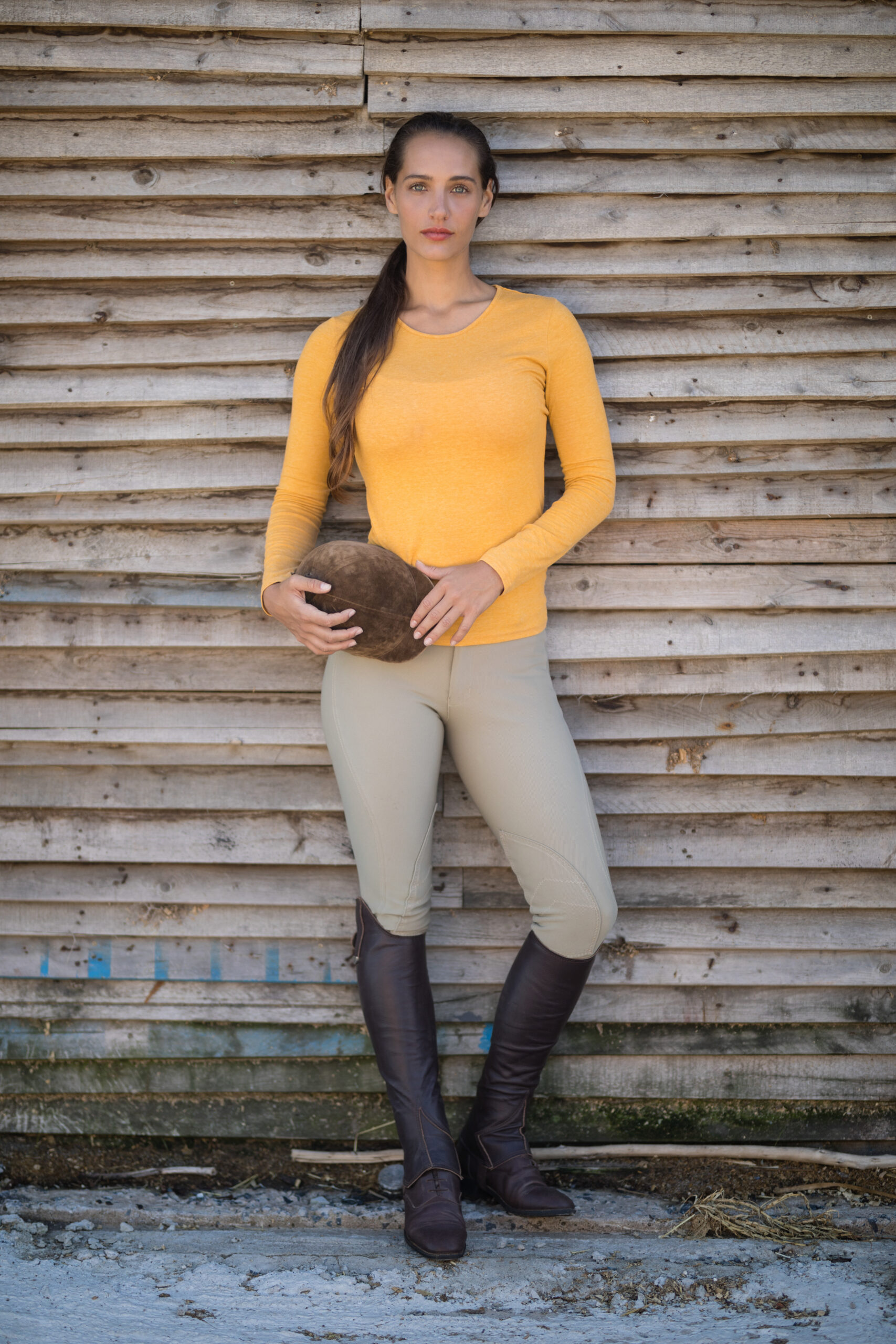 woman jockey in paddock boots